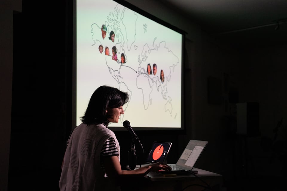 Malika presenting.