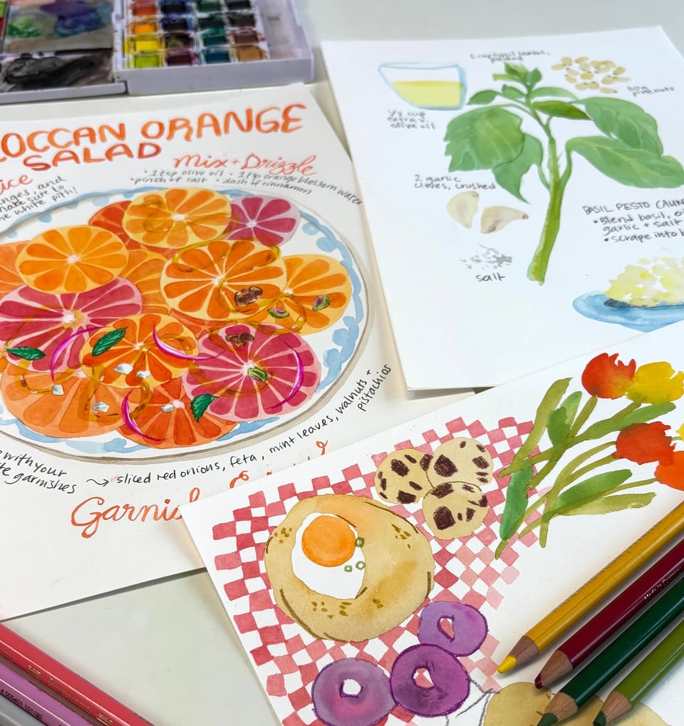 Watercolour drawings of food and plants on a tabletop