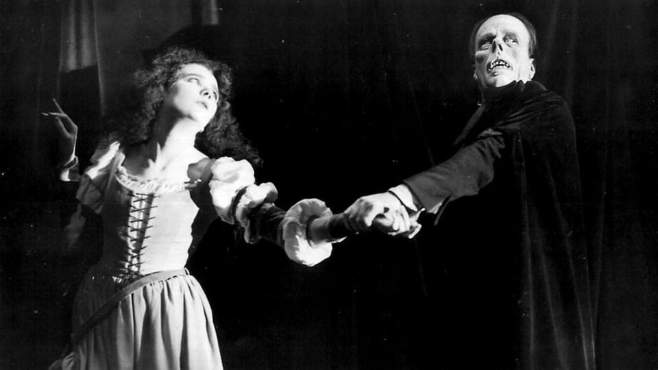 A scene from Phantom of the Opera with Christine and the Phantom