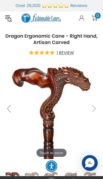 Wooden cane with a carved dragon head.