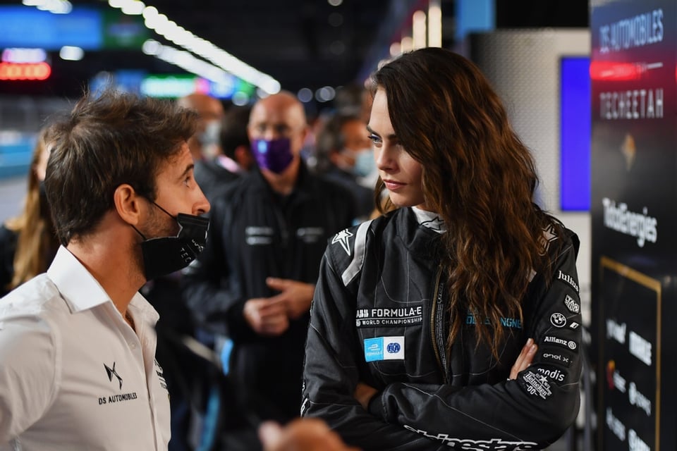 Antonio Felix da Costa and Cara Delevingne at the 2021 London Eprix, Delevingne is wearing a Formula E branded race suit
