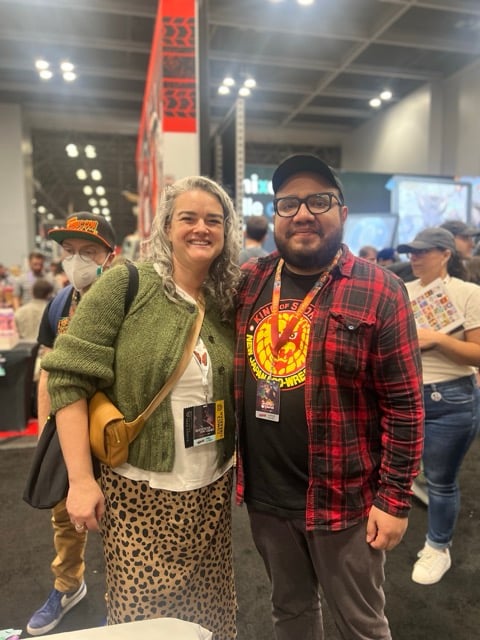 two people at a comic book convention