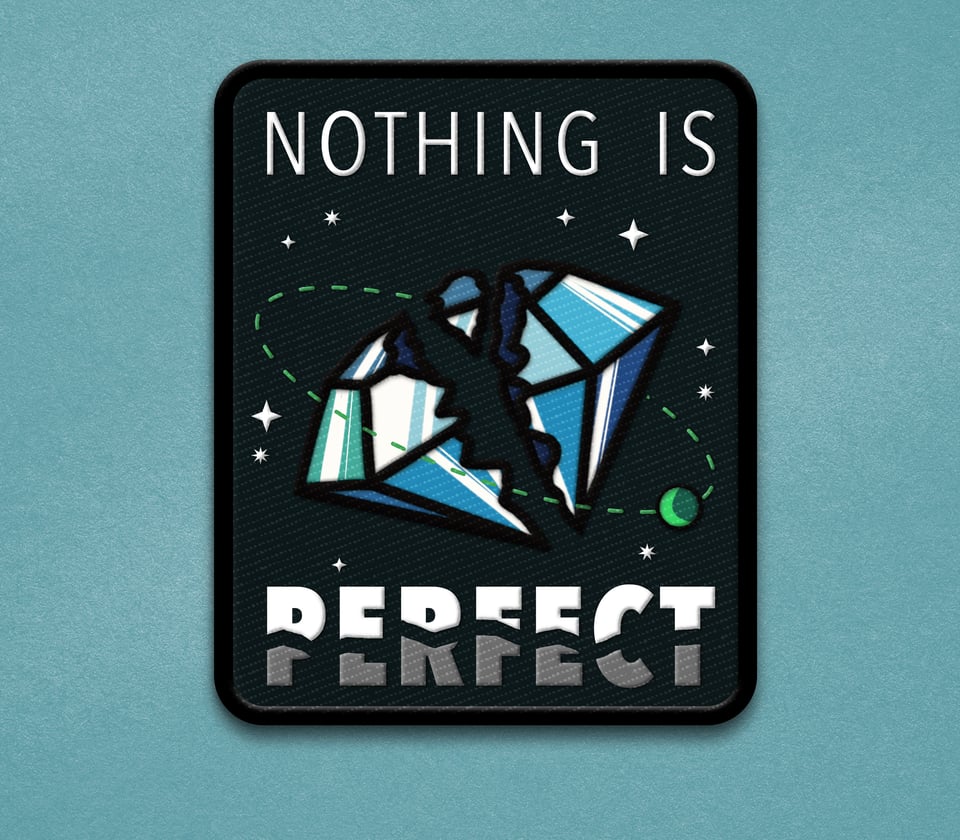 A black patch with a broken diamond on the front that looks like a planet. Text says "nothing is perfect".