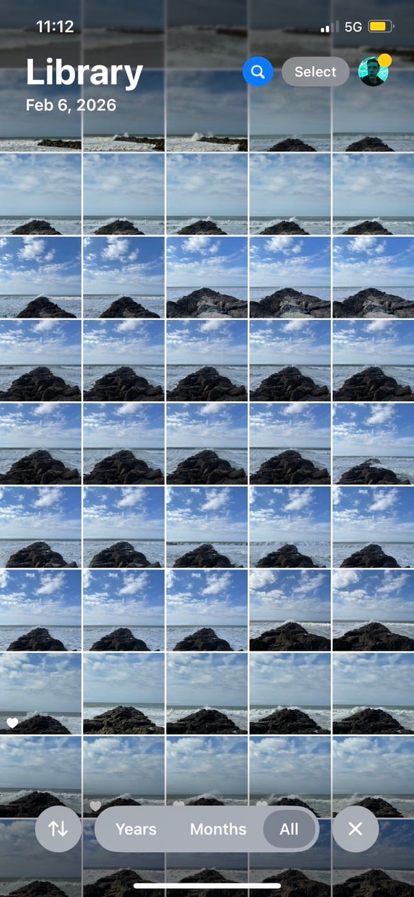 A screenshot of my phone featuring many, many images of the same breaker as waves hit it