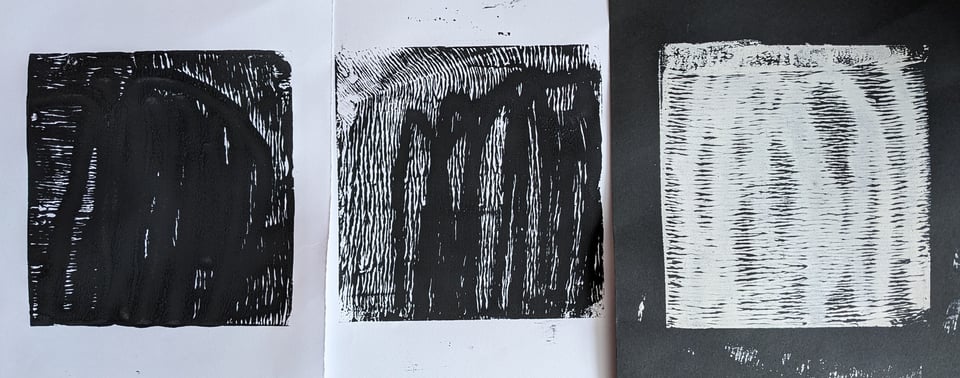 three black and white prints
