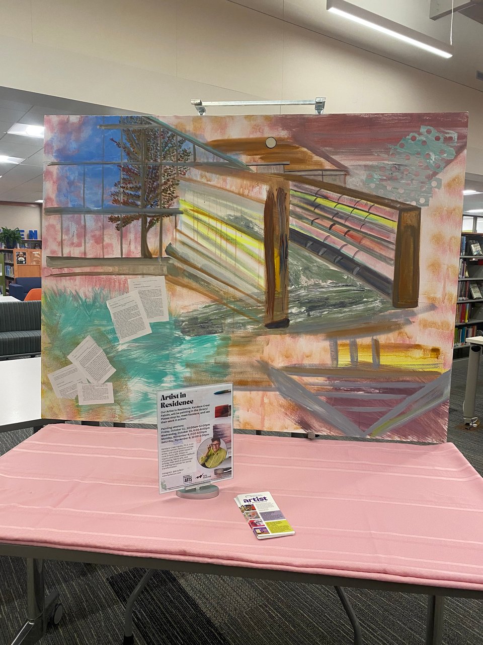 A painting of empty library stacks with a tree outside the window