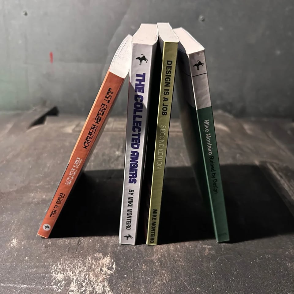 4 books (listed below) sitting on a disgusting garbage bin.