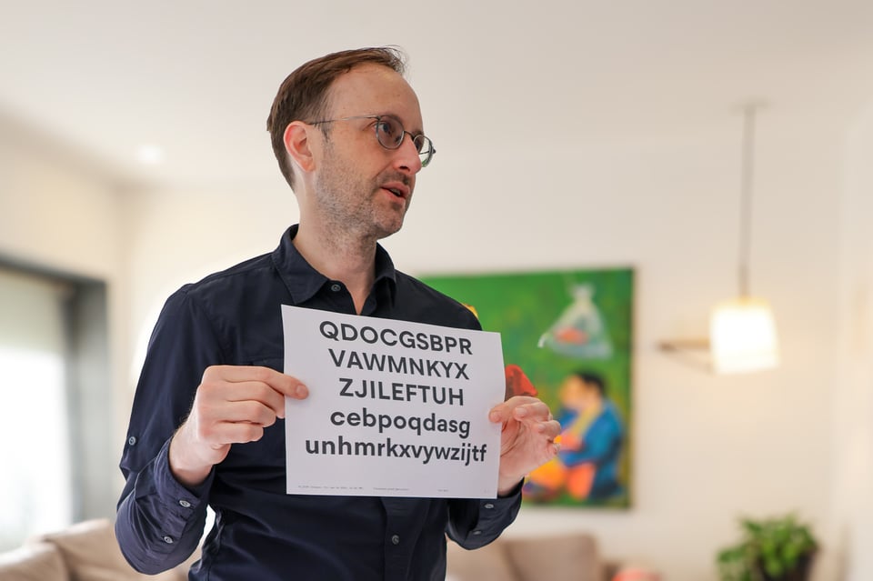 Jesse holding a proof