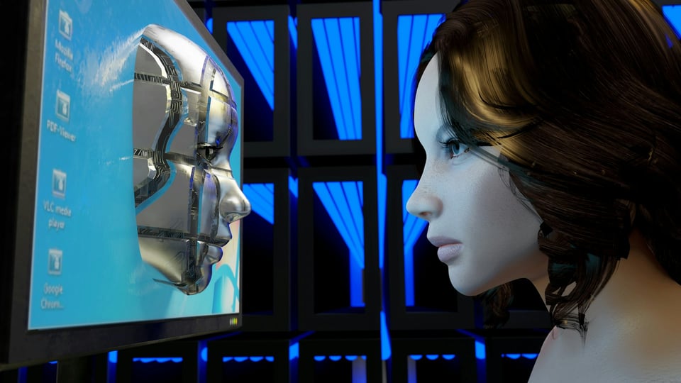 A robotic head emerges from a computer screen, to face a mannequin. Photo by Andres Siimon on Unsplash.