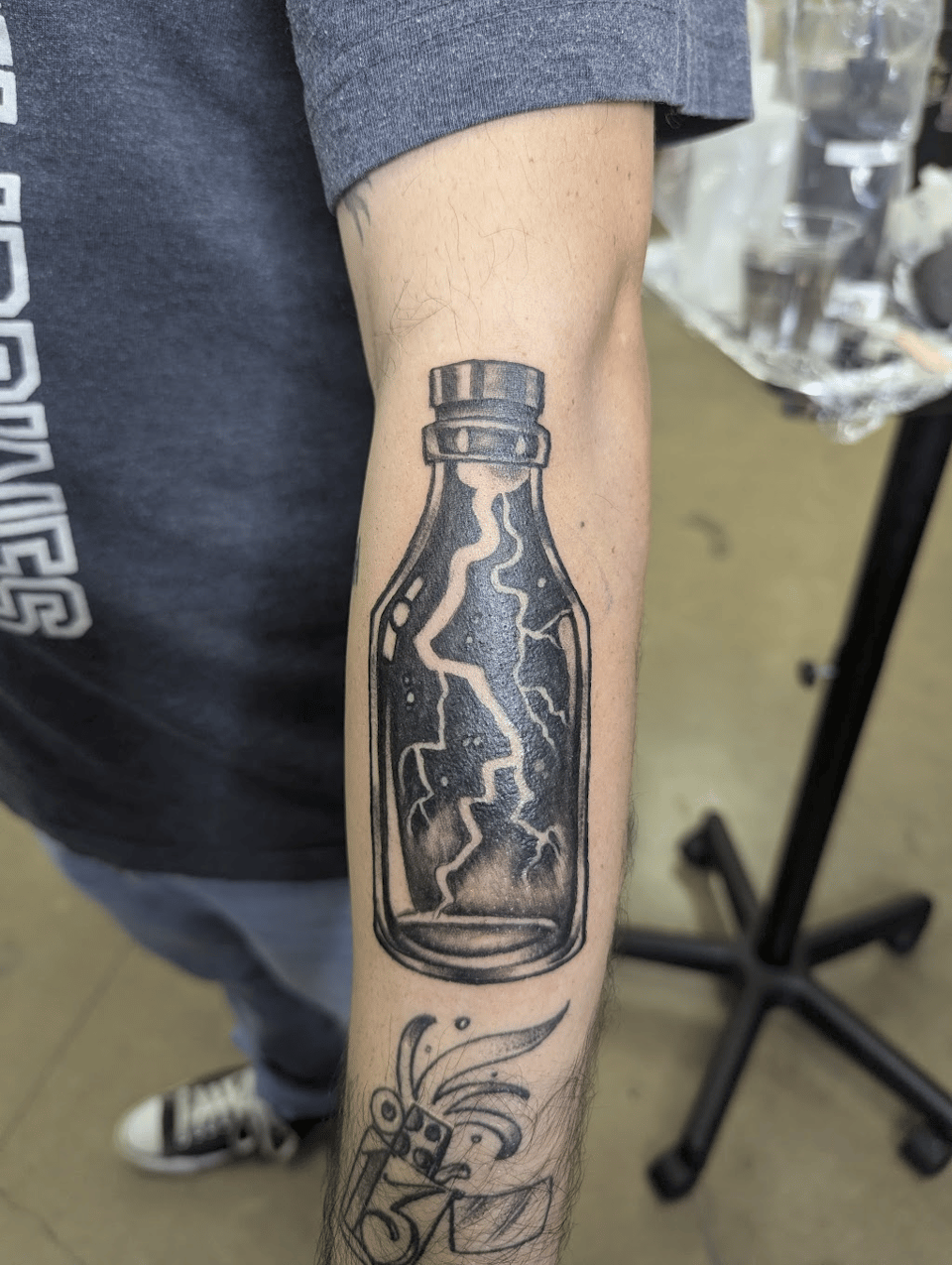 Bottled lightning tattoo