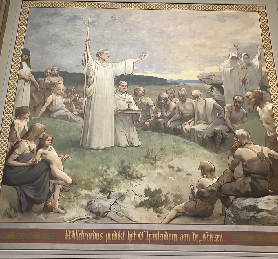 white people. one very clean white person in a white robe is holding up his hands looking holy. another clean white person in white robe is kneeling with chalice. Most of the other white people are dirty, and one random kid appears to be naked.
