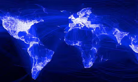 A glowing blue world map visualization depicting global Facebook friendships. Bright, interconnected lines represent the density of Facebook connections across continents, with particularly strong concentrations in North America, Europe, and parts of Asia. The visualization highlights the global reach of social networking, with darker regions indicating areas with fewer connections.