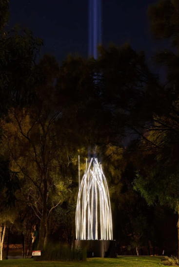 Image from the 2026 installation of Karla Bidi, showing a sculpture lighting up the night.