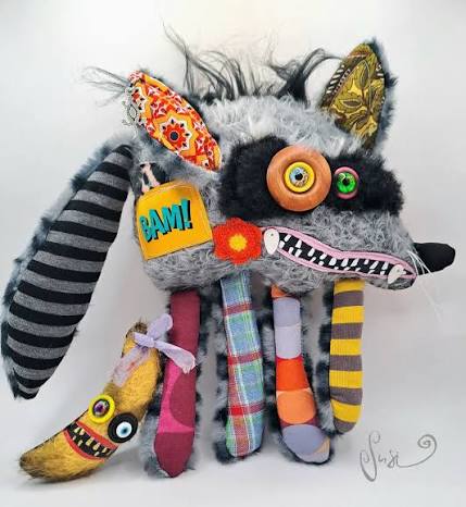 A whimsical soft sculpture of Jimothy the raccoon by artist Susann Brox Nilsen.