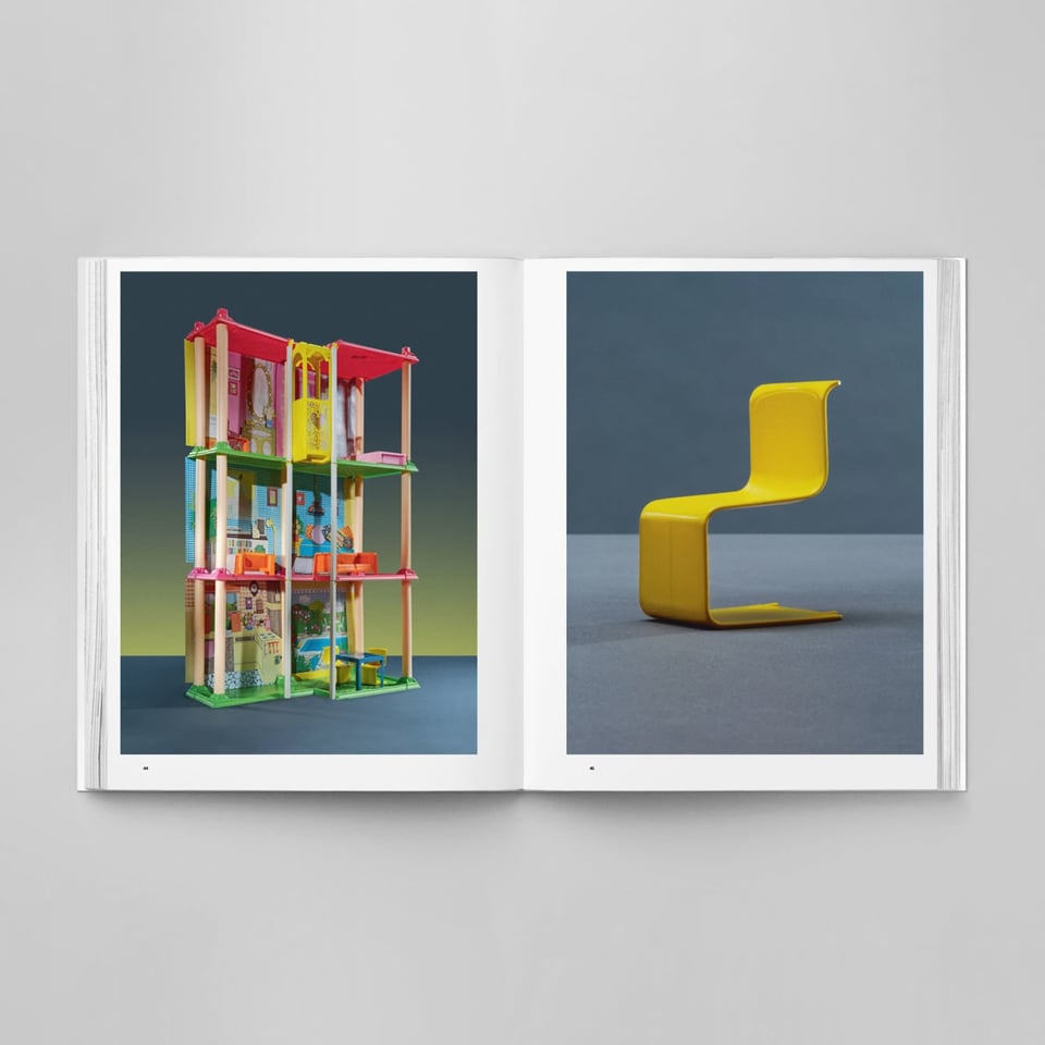 Two pages of a promotional image for an art book. on the left page is a minimalist version of barbie's dream house. On the right is a chair from the 70s set.