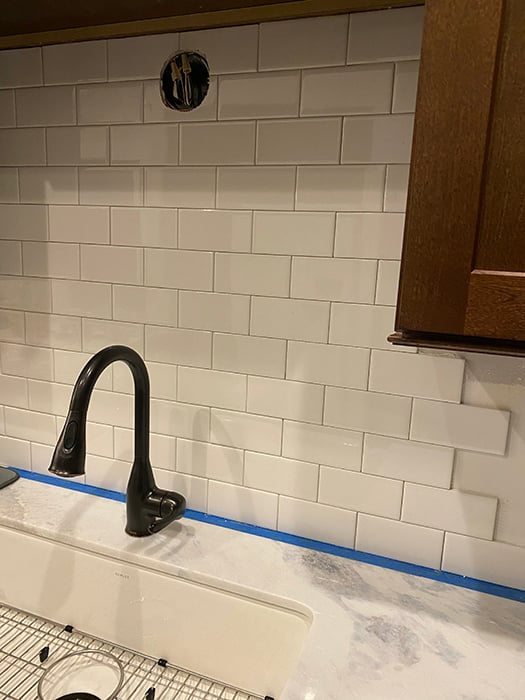A vanilla backsplash in progress
