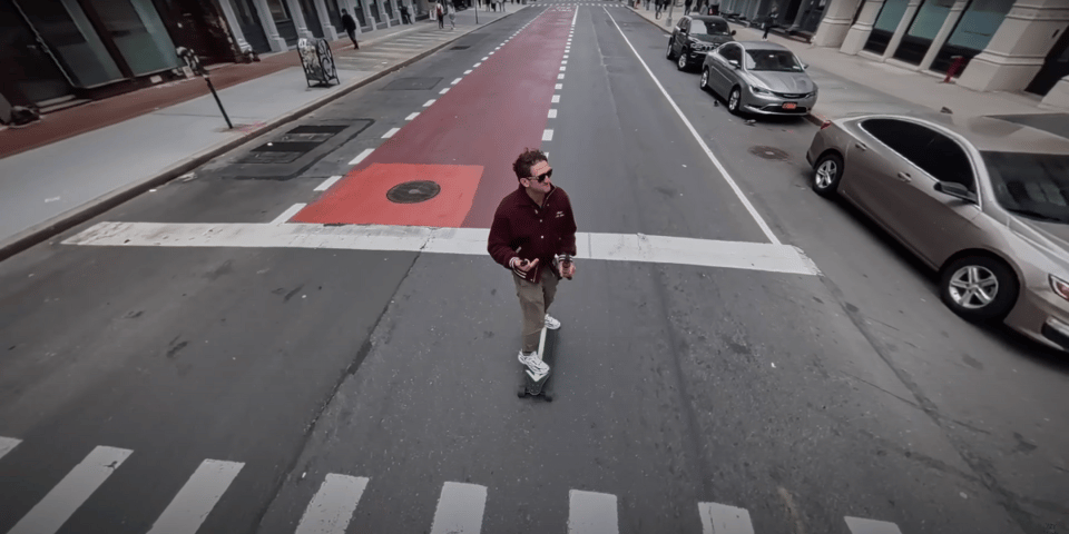 Casey Neistat on his electric skateboard