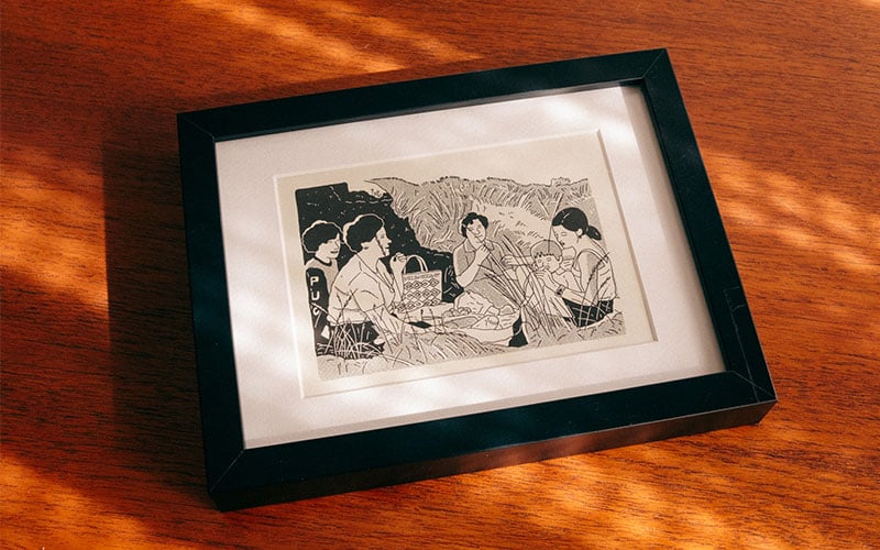 Fotografía de una ilustración enmarcada.<br/>Photograph of a framed illustration.