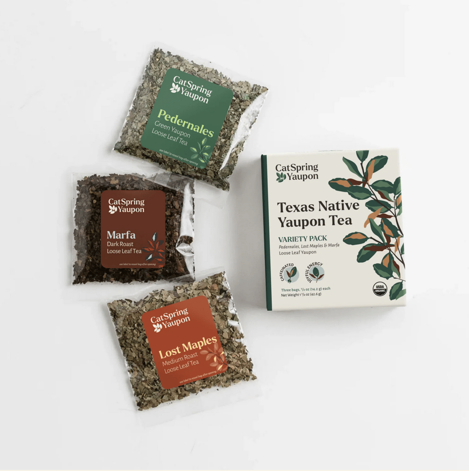 Three packs of Catsping Yaupon tea next to a box.