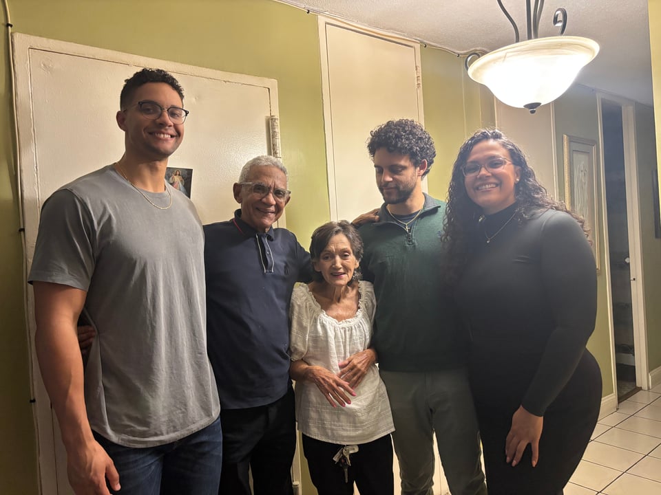 My younger brother Leo, my papito (grandpa on my mom's side), my Grandma Mervy, me, and my older sister Victoria.