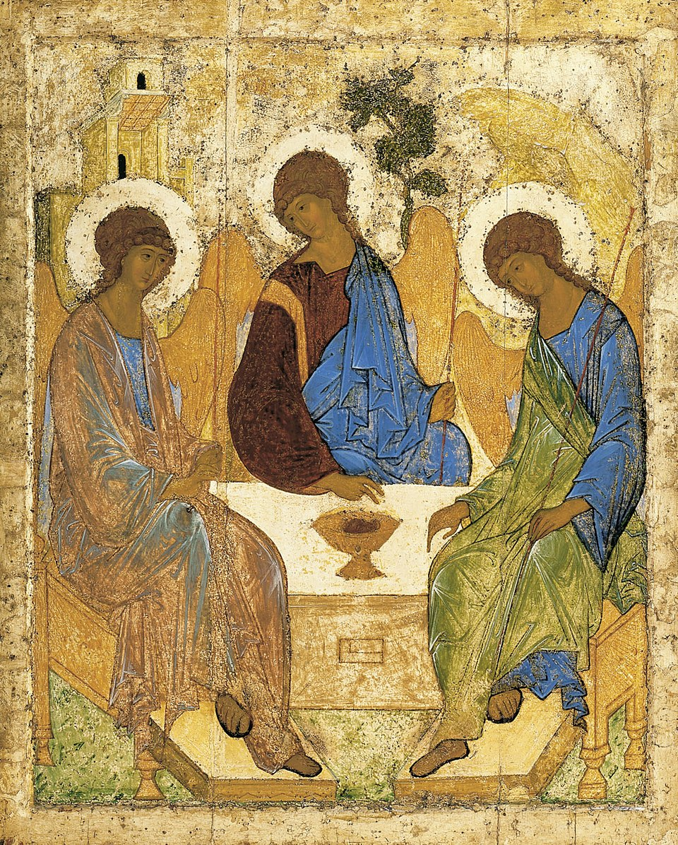 three anthropomorphic winged figures figures sit on three sides of a square table. Two of them seem to be looking at the one on our left, who seems to be looking at us. On the table is what looks like a chalice and what may be bread.