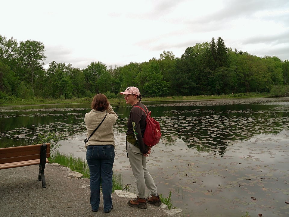 jozef and our friend from college stand by the pond together
