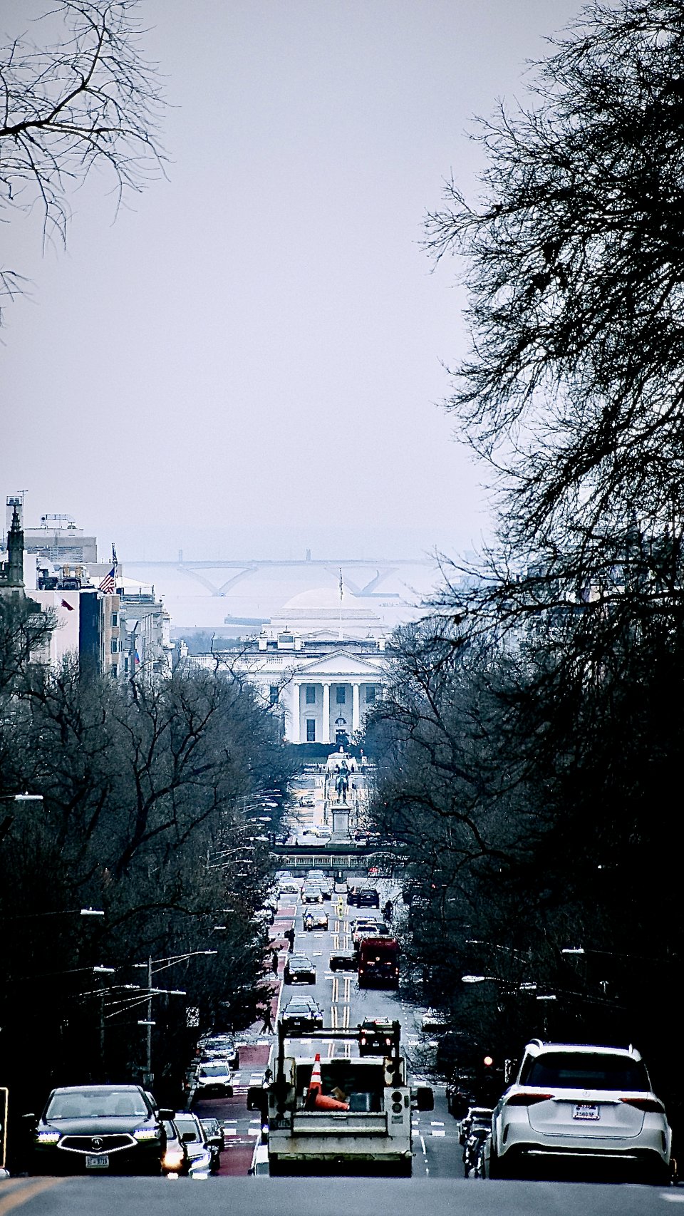 A zoom lens photo including the White House, Jefferson Memorial, and Potomac River.