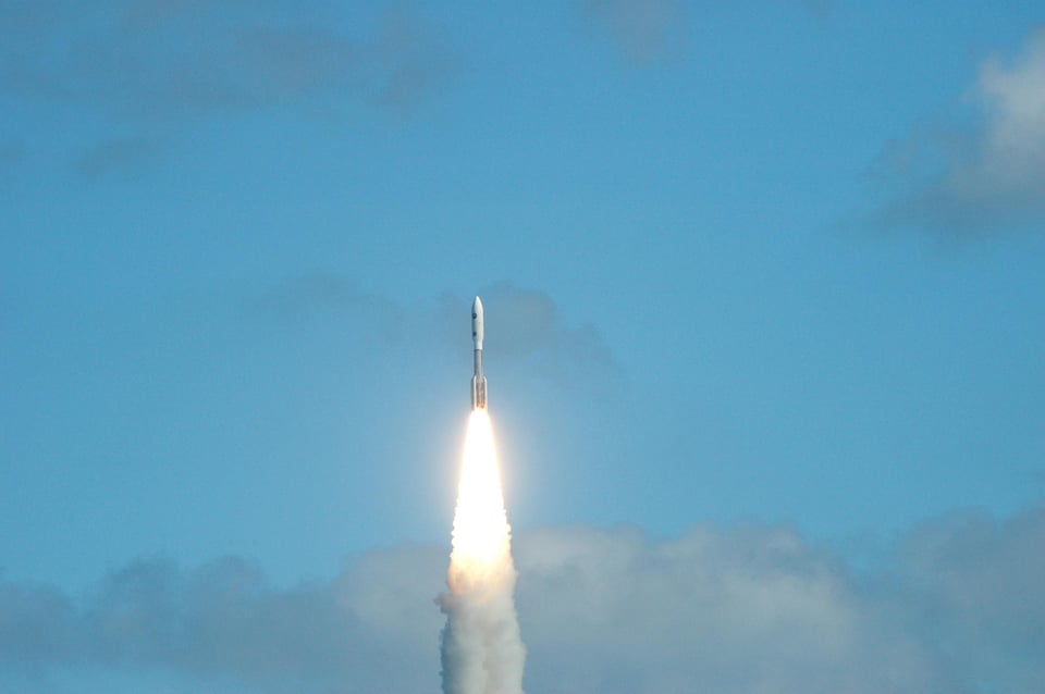 a rocket fires off into the outer reaches of space