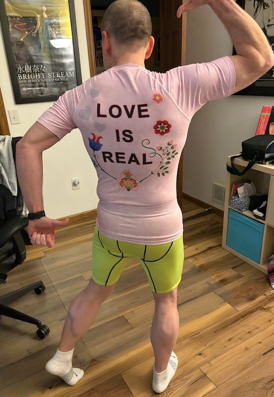 Old man with nice socks, a messy room and a sweet rash guard