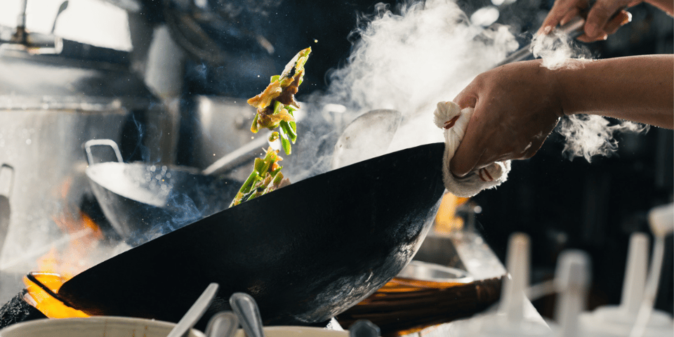 Cooking in a wok.