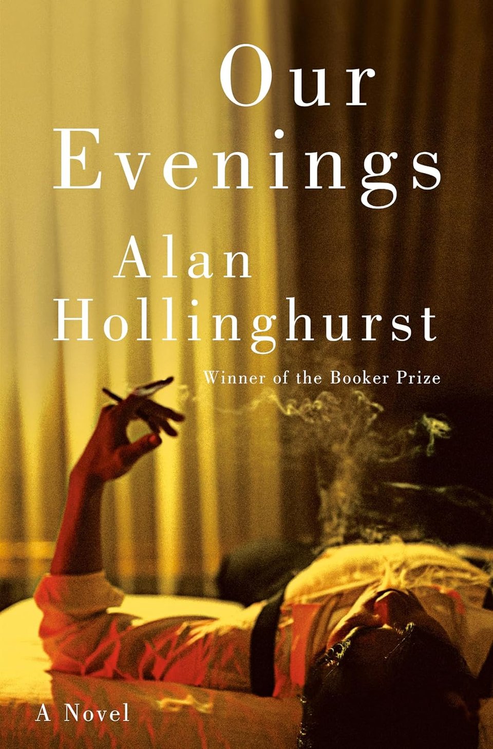 A Burmese man in an Oxford and suspenders lying on a bed, one arm up holding a cigarette and exhaling smoke. The camera is positioned behind his head and curtains are out of focus in the background. Yellow-orange light fills the room. In white serif text over the image: Our Evenings - Alan Hollinghurst - Winner of the Booker Prize - A Novel