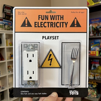 A joke product called Fun With Electricity that contains a power outlet and a metal fork