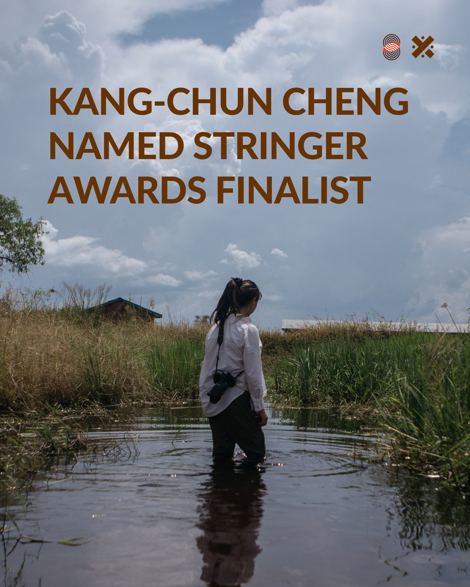 An Asian woman in a ponytail and white shirt, with a camera strapped to her back, wades through knee deep water, with the caption "KANG-CHUN CHENG NAMED STRINGER AWARDS FINALIST"