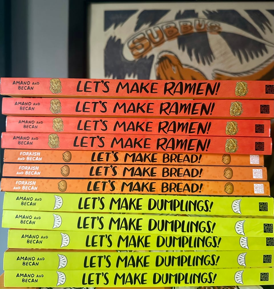 A stack of all three of the current Let's Make titles