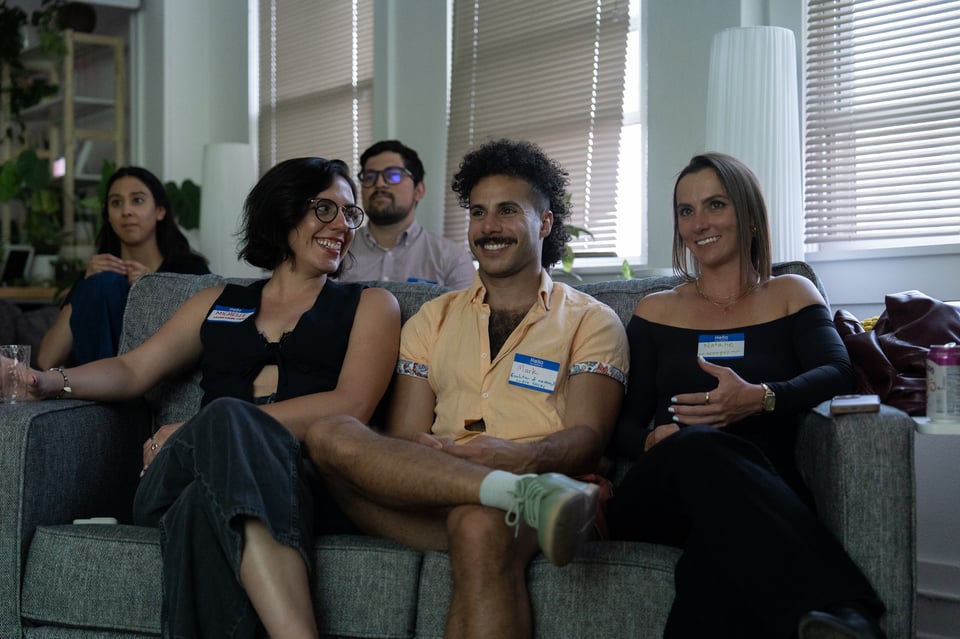 A couch of people at PowerPoint Party.