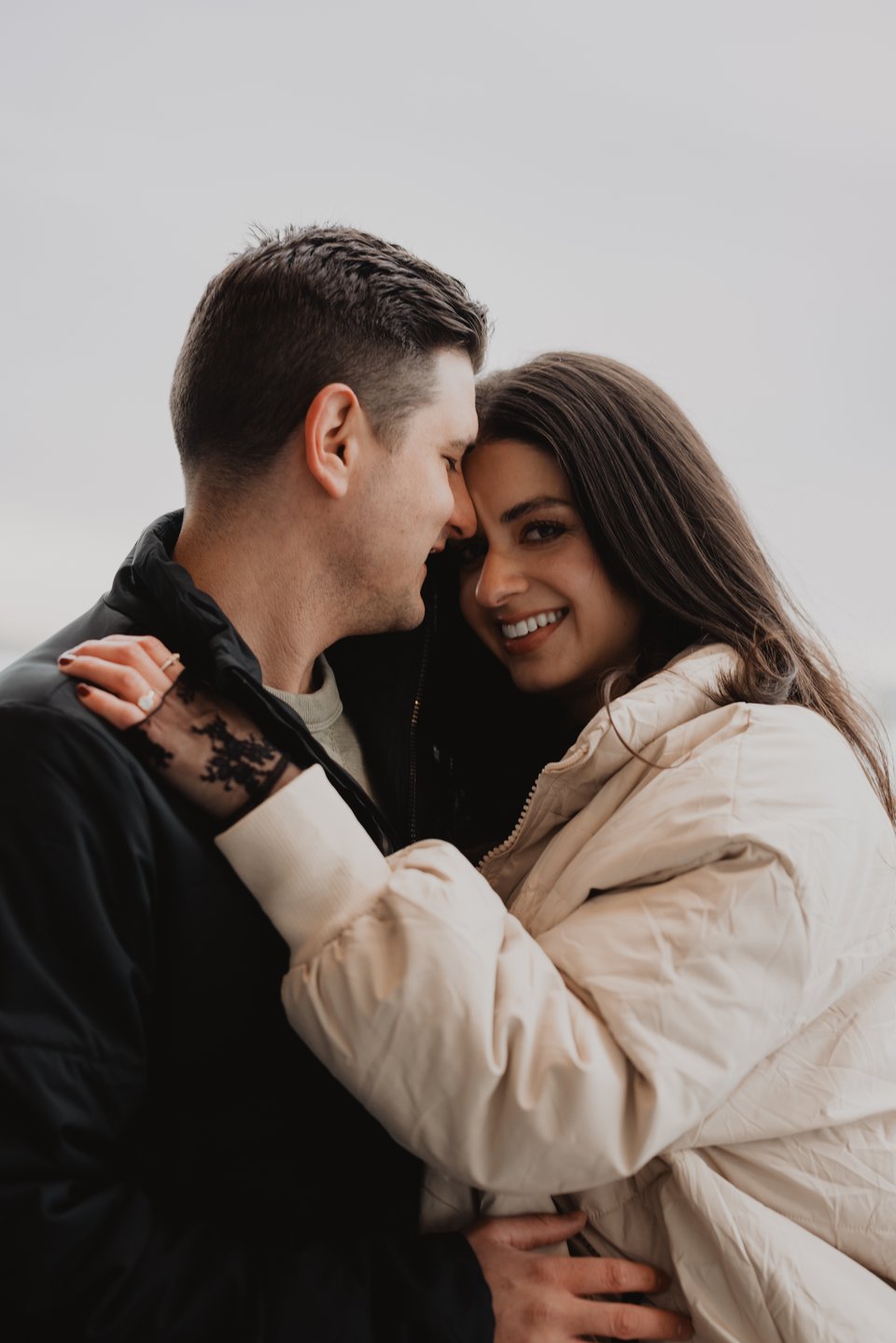 a couple hugging during their engagement session