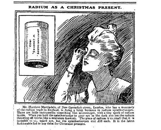 Newspaper article clipping that has the headline "Radium as a Christmas present" shows a spinthariscope and an illustration of a woman putting one to her eye and looking at it.