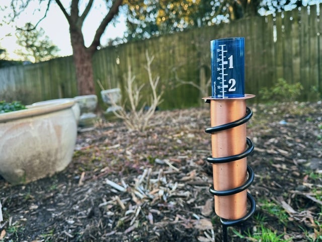 I picture of my rain gauge (a blue cylinder floating in a copper tube). Yesterday it measured just over 1 inch of rain, today it shows about 2.5 inches.