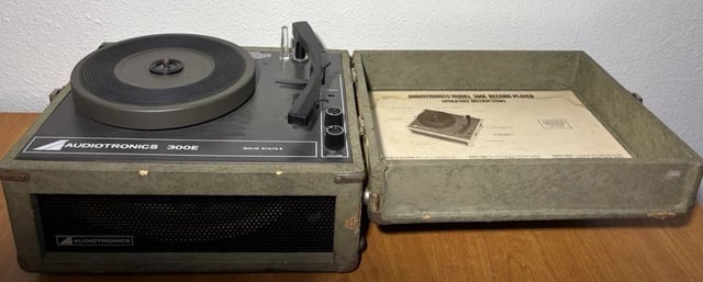 A vintage suitcase-style turntable from the 1960s.
