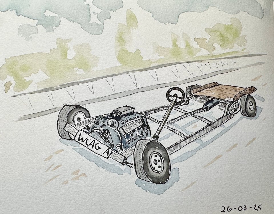 Ink and watercolor sketch of a barebone car. It has the chassis, four wheels, an engine, a steering wheel, and a wooden platform at the back. The license plate reads "WCAG A". Dated March 25, 2026.