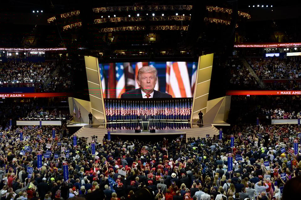 Image of the RNC with Trump's face on a screen