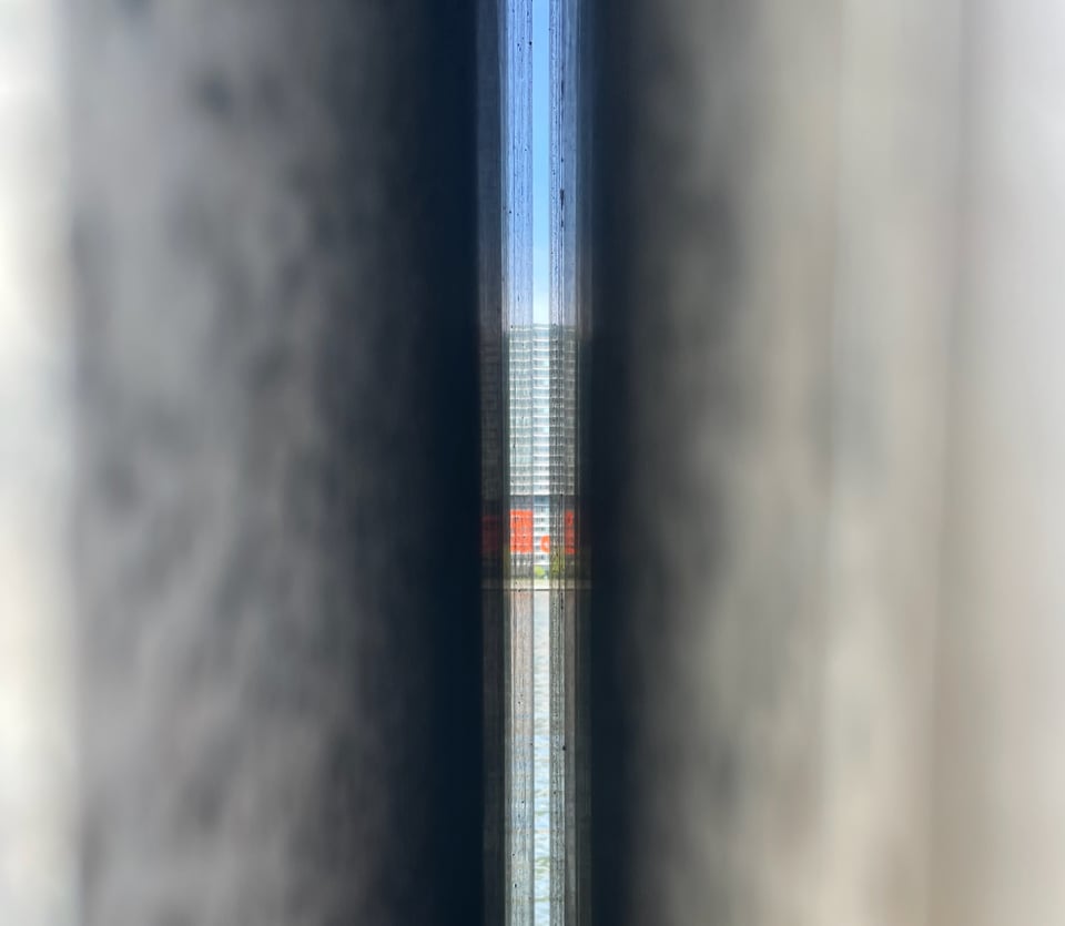 a view of Brooklyn between marble slabs