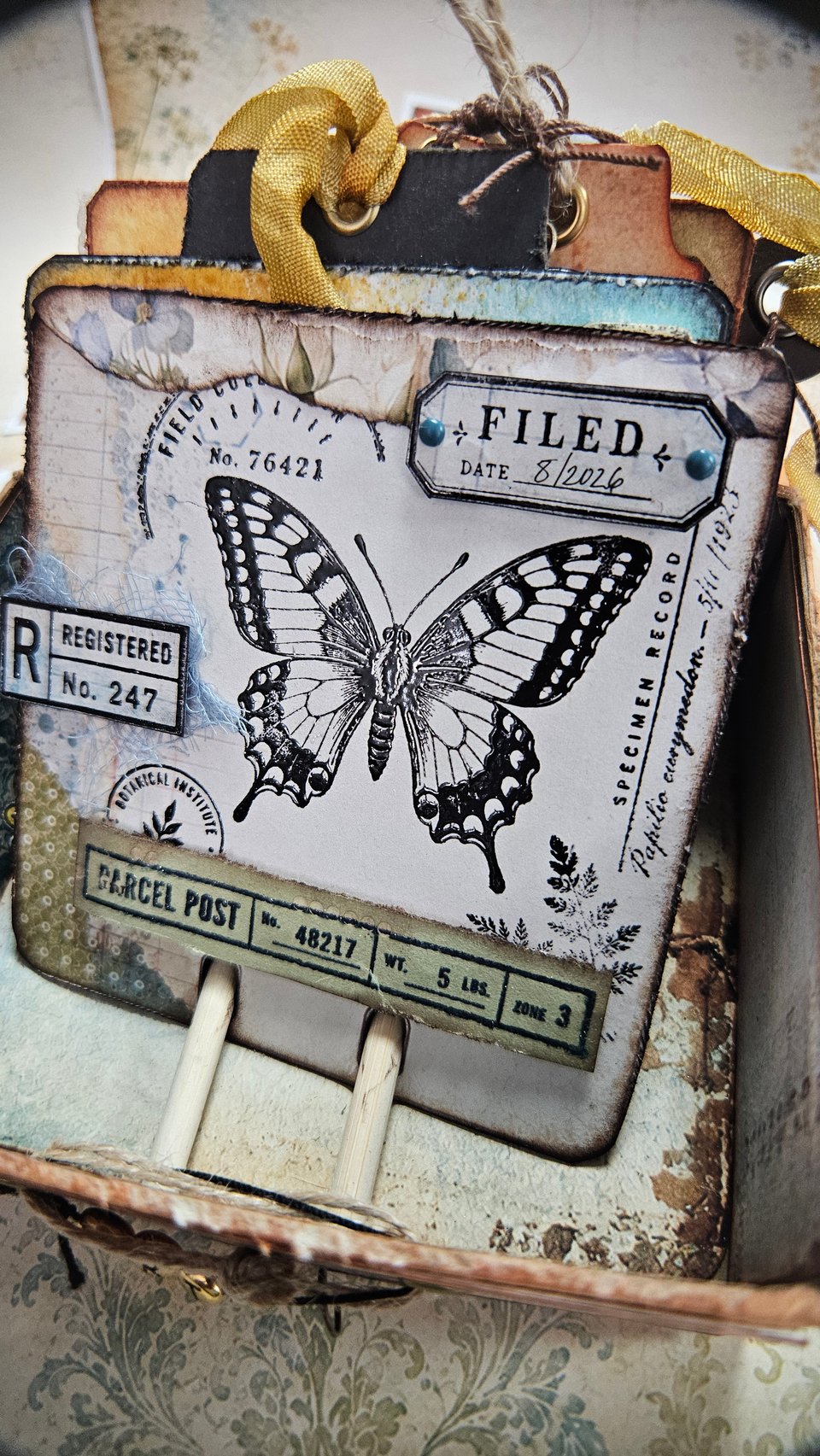 ISC Q3 mixed-media sample using Butterfly Register and Filed & Posted red rubber stamps