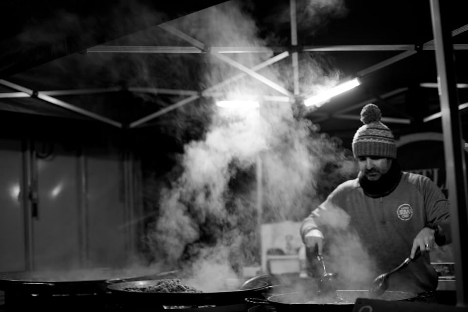 Man cooking paella