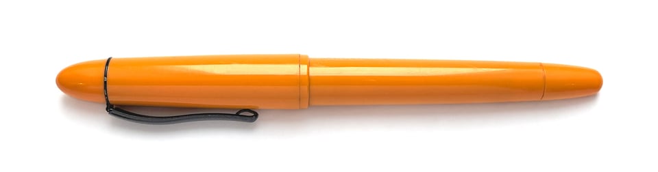 photo of an orange fountain pen