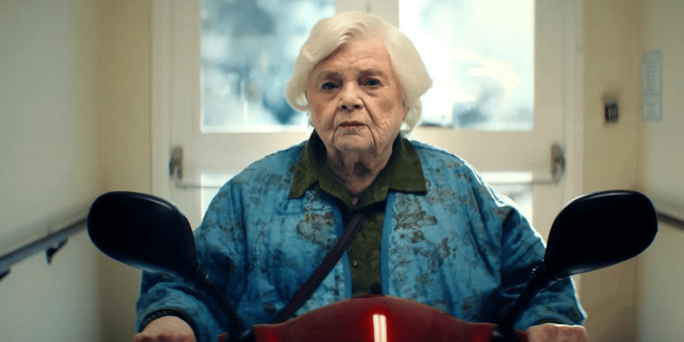 June Squibb on her scooter.