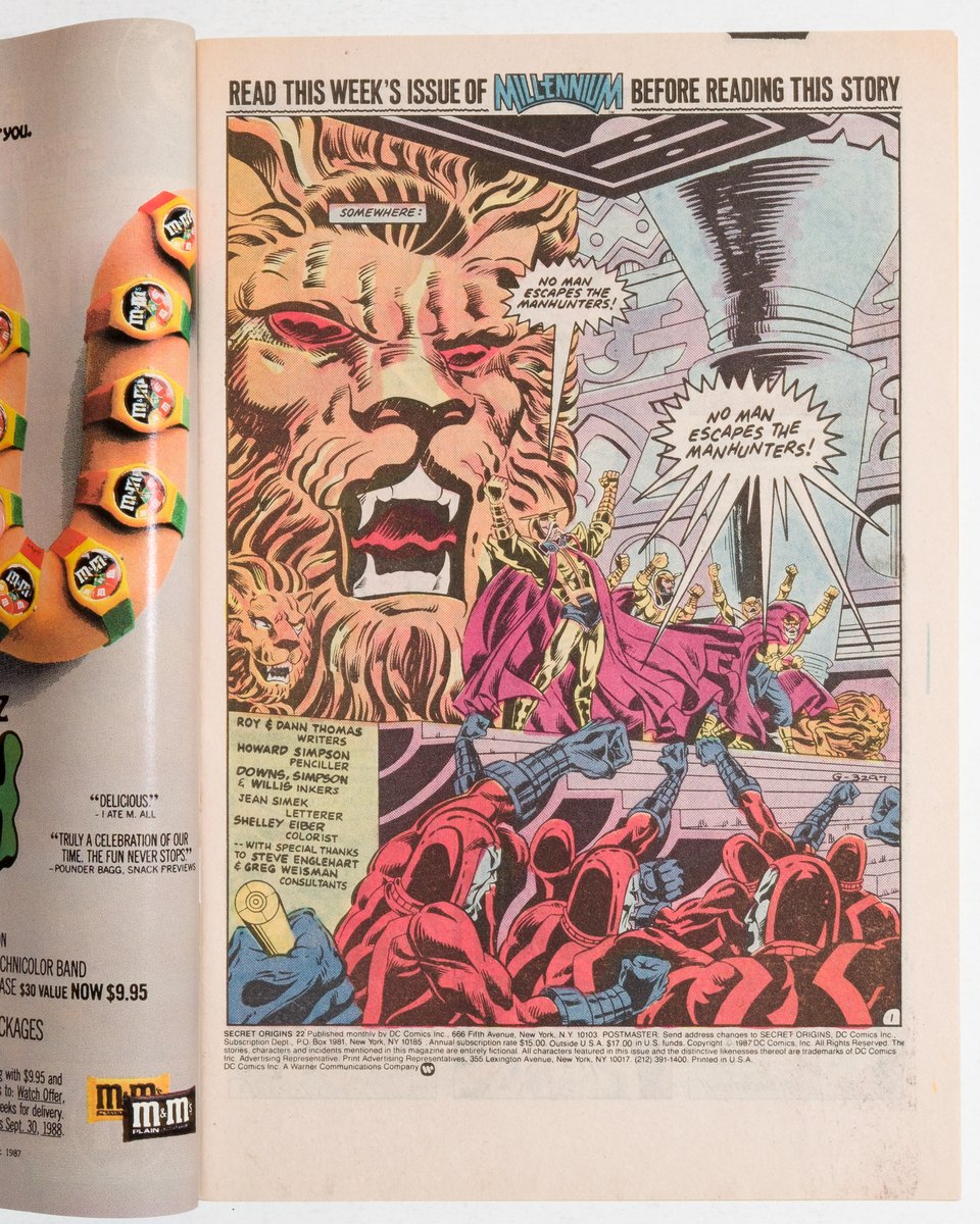 page one of Secret Origins. Manhunters chanting in front of a large lion screen