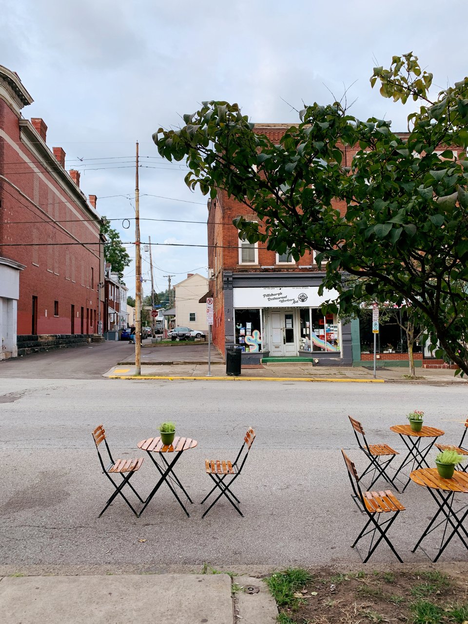 outdoor cafe seating placed right on the road