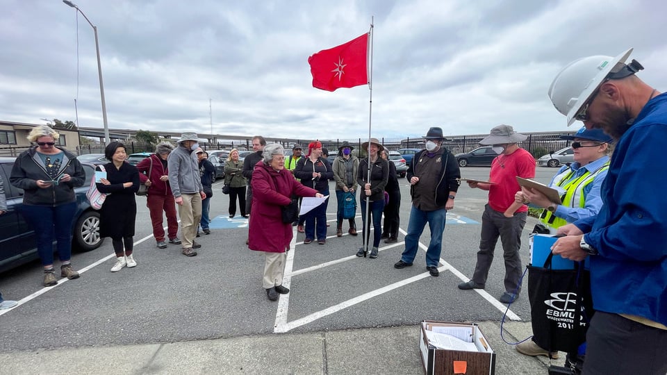People signing in outside EBMUD water Treatment Plant