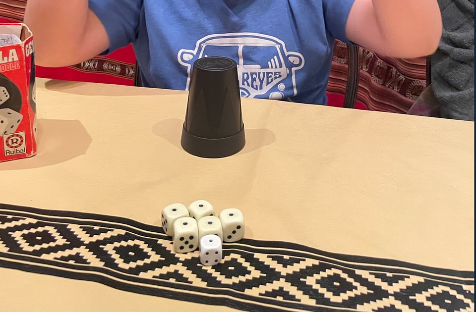 Six dice are shown all with the number one.